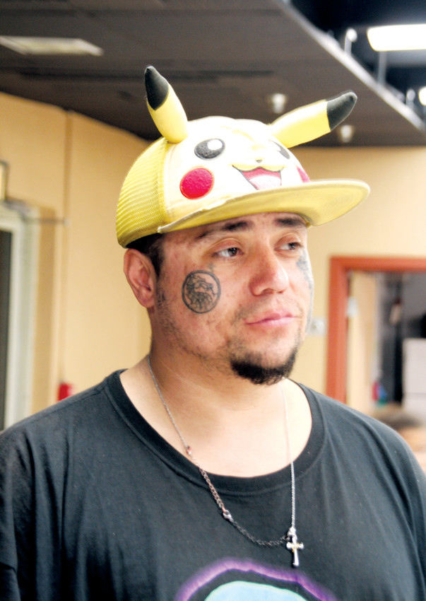 Mitch Pino, 34, wearing his Pikachu hat, was born and raised in Denver and currently lives in a cave in Jefferson County. He stayed at the Westwoods Community Church’s Severe Weather Shelter on Jan. 29 and was one of the Jeffco residents facing homelessness counted in the Point-in-Time survey.