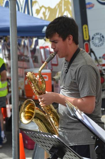 Saxophonist David Cook from the Mile High Community Band plays at the Beer Garden during Arvada Harvest Festival.