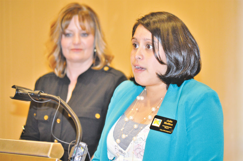 Northglenn City Councilor Julie Duran Mullica discusses the impact a proposed sales tax for transportation will have on her city as Thornton Mayor Heidi Williams listens during a Sept. 25 press conference at the Westminster Marriott Hotel.