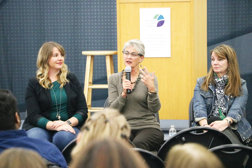 Lissa Miller, left, Jeannie Ritter and Maureen Lake share their experiences with mental illness at the second Time to Talk community forum at James H. LaRue library in Highlands Ranch. About 50 people attended the Nov. 14 event.