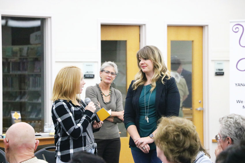 Parent Sarah Goyette, left, asks Lissa Miller for advice on how to find the right type of help. The women connected at the second Time to Talk forum on Nov. 14 at James H. LaRue library in Highlands Ranch.