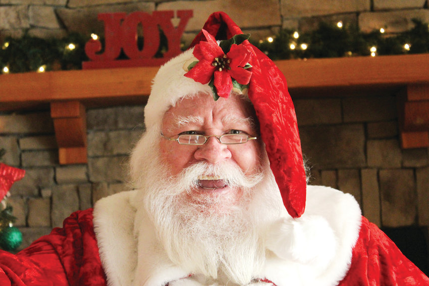 Bryan Austin, 60, in his full Santa suit at a Nov. 9 Christmas party hosted by a local Mothers of Preschoolers group.