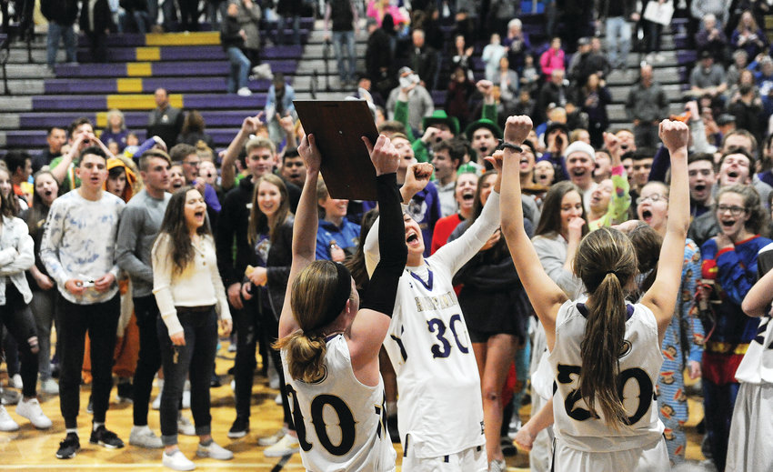 Holy Family basketball players and students celebrate their first return to the CHSAA Girls 4A Final Four since 2014, following their win over Greeley Central in a Great 8 playoff game March 1, at Holy Family High School in Broomfield.