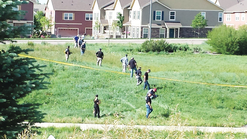 Police comb the area near 128th and Jasmine in Thornton June 9, 2017 near where the body of 10-year-old Kiaya Campbell was found the night before. Campbell was reported missing the night of June 7. Her body was found a mile away from her  Thornton house.