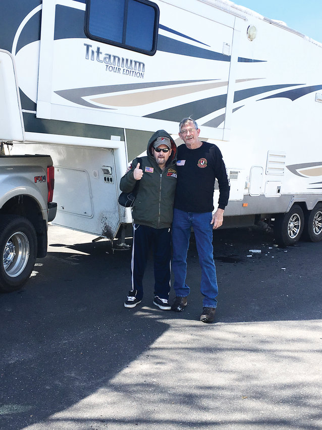 Christian Redman, left, and Ray Simpson, a fellow Blackhorse veteran from Colorado Springs, stand in front of Simpson’s camper March 5 in Parker.  two were scheduled to leave on the first leg of Maverick’s Last Ride, Redman’s caravan trek to Kentucky and Key West. But Redman became sick right before leaving. He was able to fly to Louisville on March 8 and join Simpson and other veterans there in time for his daughter’s March 10 birthday.