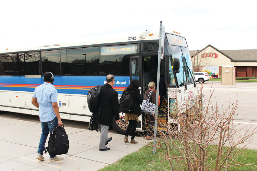 Passengers board the P route bus to the Civic Center in downtown Denver from Parker's Jordan Road Park-n-Ride station. The P route is the most popular of the two long-distance coaches that serves Parker, and some residents think it's not enough.