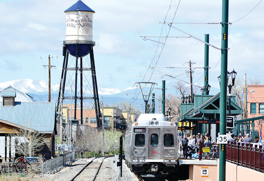 Passengers board the G-Line during the grand opening celebration Saturday, April 27, in Olde Town Arvada.