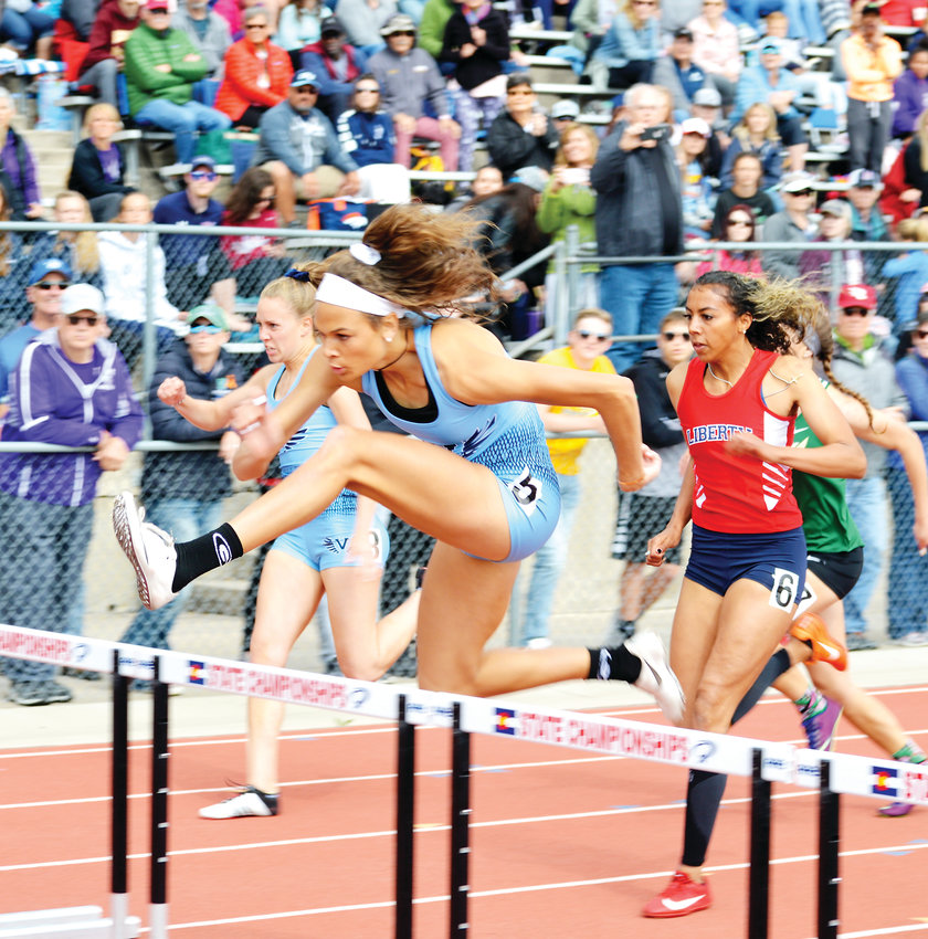 Valor Christian senior Anna Hall wins the 100 meter hurdles on May 18 at the CHSAA State Track Championships at Jeffco Stadium. Hall also won the 300 hurdles and anchored two record setting relay teams and help lead the Valor girls to the state championship.