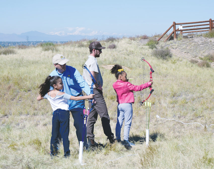 Kids engage in archery at Rocky Mountain Arsenal National Wildlife Refuge.