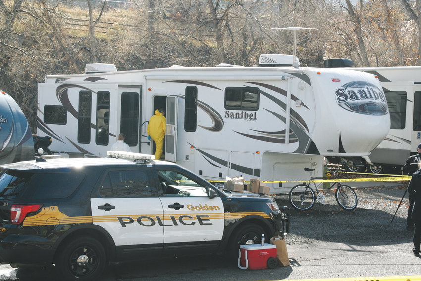 Investigators enter the RV trailer on Oct. 31 where Mitchell Bradford Ingle, 63, was discovered deceased after a welfare check was requested by the Salt Lake City Police, following a shooting they are investigating that happened on Oct. 30 on the University of Utah campus.