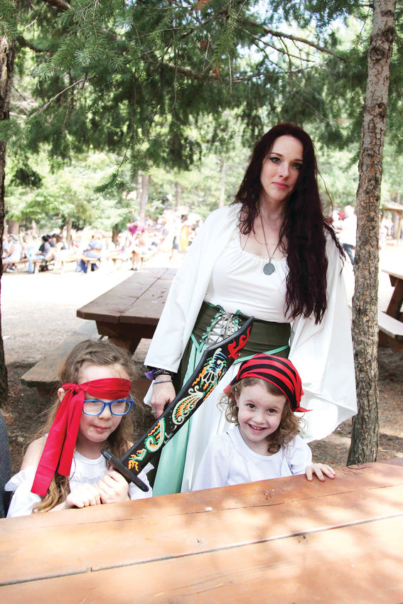 Sarah Periat has attended the Renaissance Festival since her childhood and now brings her family to the event. She sewed her costume.