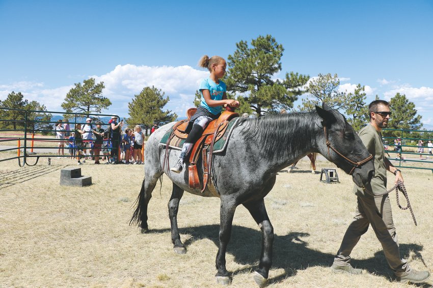 Emily Campbell, a fourth-grader at Pine Lane Elementary, rides a horse during Highlands Ranch Pioneer Days. The annual event exists to celebrate the state’s heritage.
