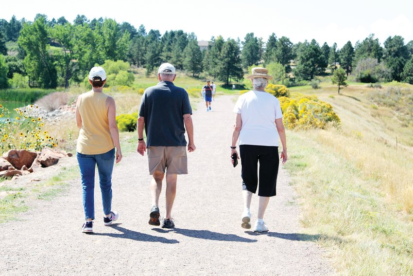Part of trail etiquette means staying to the right and allowing oncoming trail users space to pass, not taking up the width of the trail like these pedestrians at Bingham Lake Park in The Pinery, near Parker.