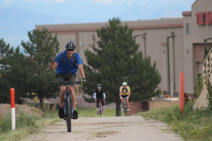 People bike to work from the Willow Creek Trail near C-470 and Yosemite in Lone Tree, a popular spot for recreational and commuter cyclists.