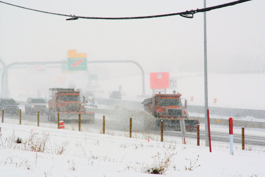 Two plows make their way on C-470 in Highlands Ranch at about 1 p.m. during the Oct. 29 snowstorm. A new law now makes it illegal to pass working snowplows.