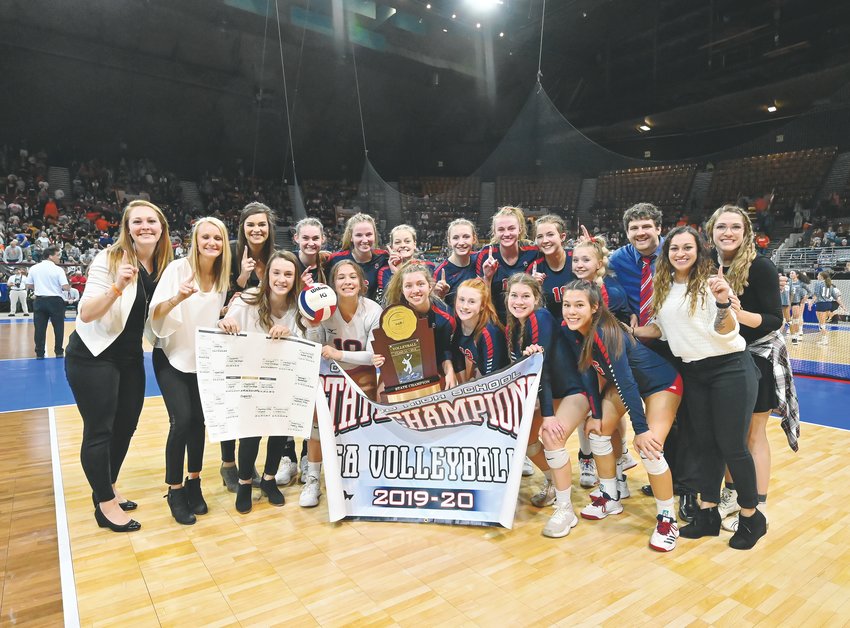 Chaparral celebrates its Class 5A championship after defeating Valor Christian 3-1 on Nov. 16 at the Denver Coliseum.