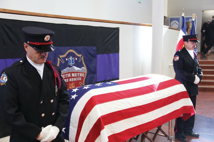 Fire rescue personnel stand watch at the casket of former South Metro Fire Rescue Assistant Chief Troy Jackson Dec. 20 at Denver First Church Of The Nazarene in Cherry Hills Village.