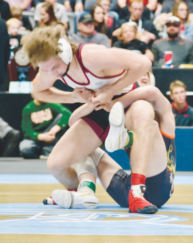 Ponderosa’s Jaron Mahler appears to be in control but he  lost a 3-1 decision to Grand Junction’s Kieran Thompson in the 132-pound Class 5A title match at the state wrestling tournament on Feb. 22 at the Pepsi Center.
