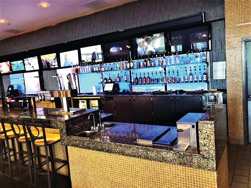 The bar at Regal Southglenn in Centennial. Drinks can also be taken into the theaters.