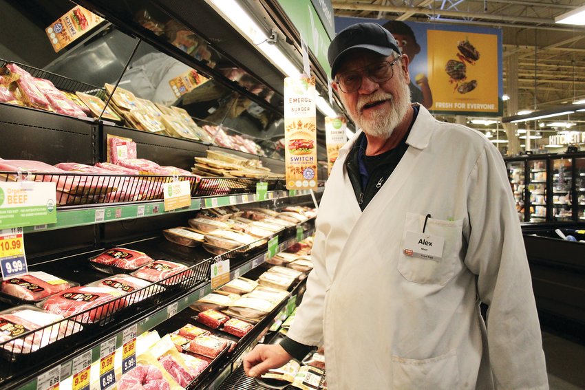 Alex Johnson, a meat clerk at a King Soopers at 7984 W. Alameda Ave. in Lakewood takes a break from working. Johnson said he isn't worried about grocery stores running out of food. Instead, he is more worried about those who have lost their jobs due to the COVID-19 pandemic.
