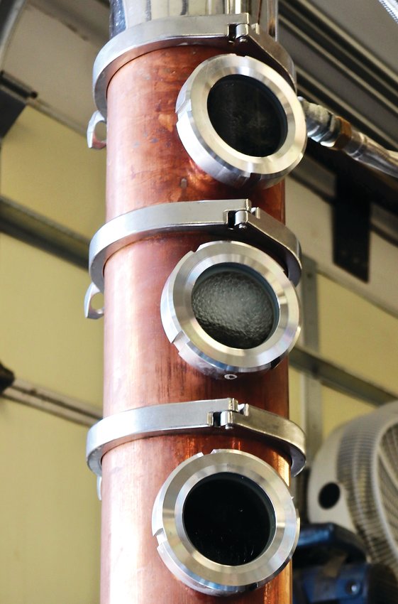 Ethanol rises through distilling equipment at Ballmer Peak Distillery during the sanitizer-making process.
