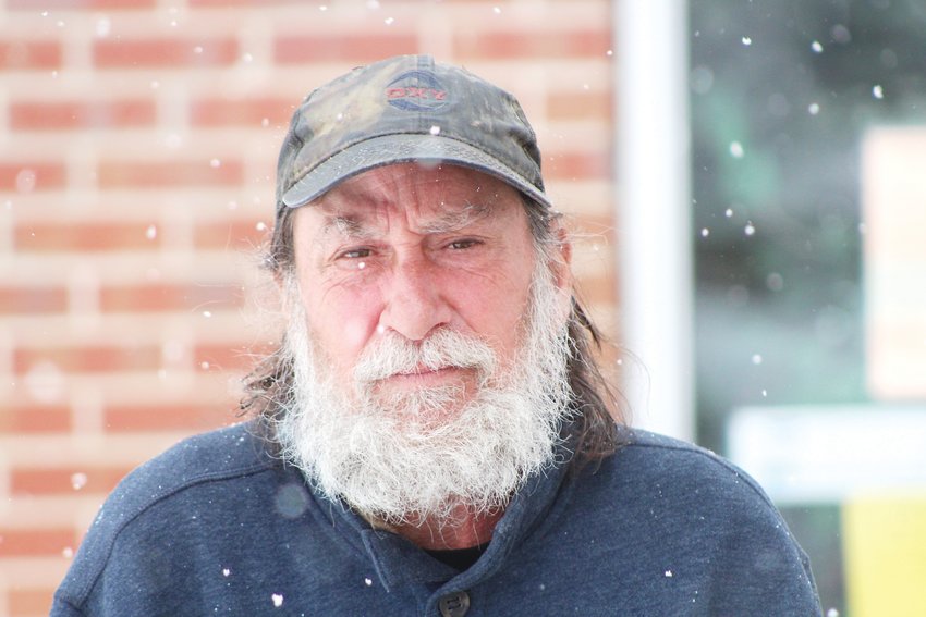 Wayne Graham stands outside Mean Street Ministry in Lakewood on April 16. Graham, who said he was homeless at the time, said there was nowhere for him to go on cold days as places like libraries were closed because of the COVID-19 pandemic.