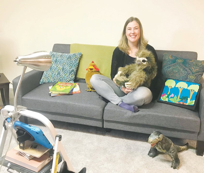 Karen Walker, a kids and family librarian at the Jefferson County Library District, inside the virtual studio she has created inside her home for presenting virtual programs, such as storytime.