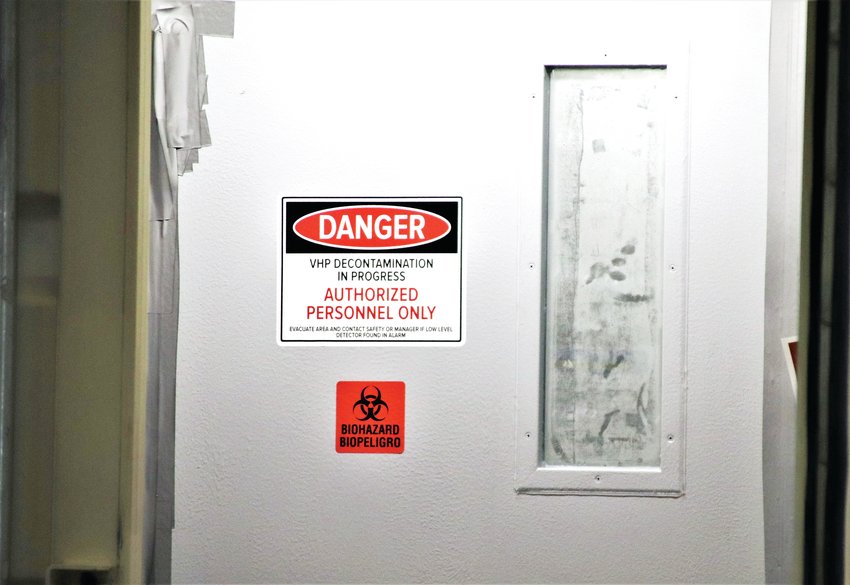 A window on the door to the N95 decontamination chamber is clouded with hydrogen peroxide vapor May 14 at the Adams County Fairgrounds Exhibit Hall.