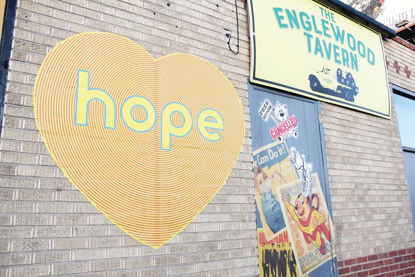 A large heart bearing the word “hope” sits on the wall of the building that houses The Englewood Tavern on South Broadway May 20. Artist Koko Bayer has placed the hearts throughout the Denver metro area — including a 12-foot-by-12-foot version of it on the Arvada Center building, according to Collin Parson, the center’s director of galleries and curator. “It’s things like those that give me hope and energy to keep getting art out there,” Parson said.
