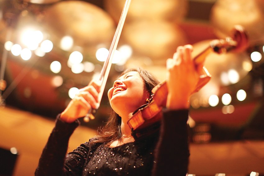 Yumi Hwang-Williams, violinist and concertmaster with the Colorado Symphony, is celebrating her 20th year with the orchestra this season. The orchestra is looking forward to performing live again, once it is safe to do so following the COVID-19 pandemic, Hwang-Williams said.