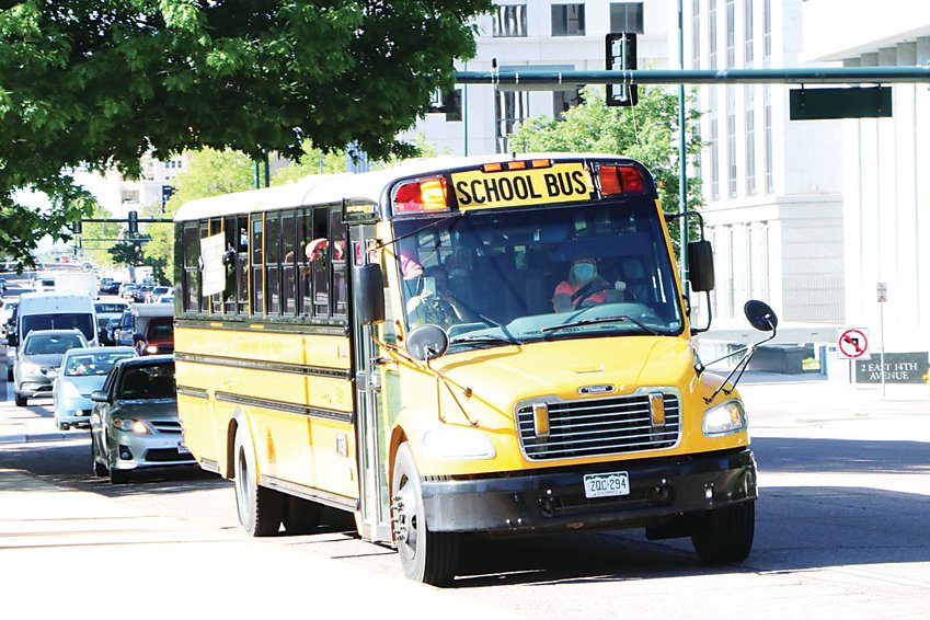 A Jeffco Public Schools bus. After a series of plan revisions, it looks like Jefferson County students may be physically heading back to their schools a lot more frequently than initially thought.