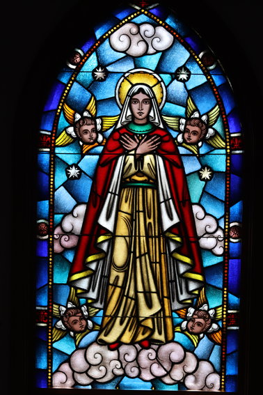 A stained glass image of Mother Cabrini inside the Mother Cabrini chapel at Mother Cabrini’s Shrine.