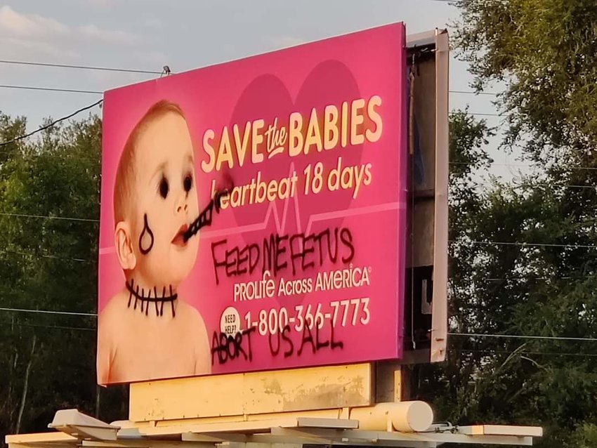 The pro-life billboard on South Golden Road, which was vandalized days earlier. The billboard was taken down, but then the blank space was also spraypainted.