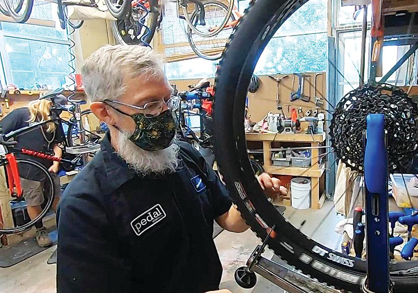Pedal bike shop in Littleton has seen business surge during the pandemic.