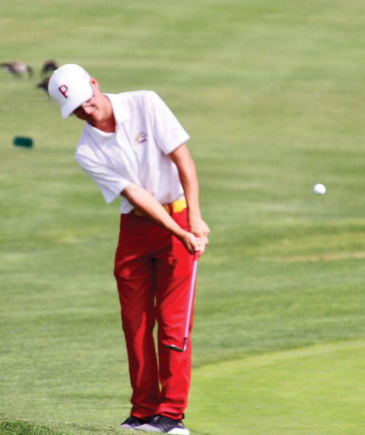 Ponderosa's Johnny Williams chips towards the 18th green on Sept. 15 during the final Continental League boys golf tournament of the season. Williams shot a 1-over-par 73.
