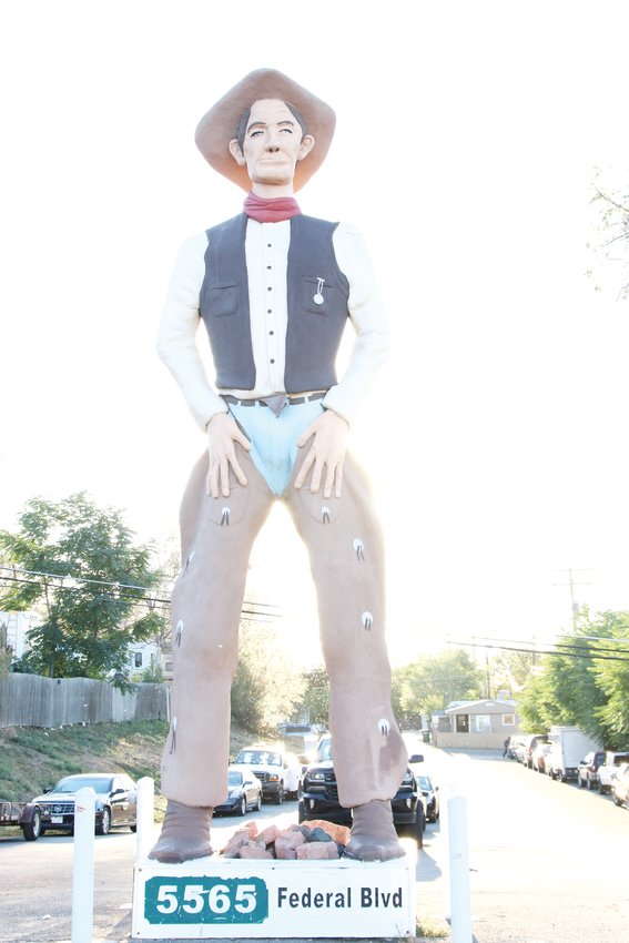 The 30-foot cowboy statue at the entrance to Rustic Ranch Mobile Home and RV Park on North Federal Boulevard Sept. 12. The cowboy was originally intended as part of an amusement park that never materialized, according to an old news article clipping that the park manager has held onto.
