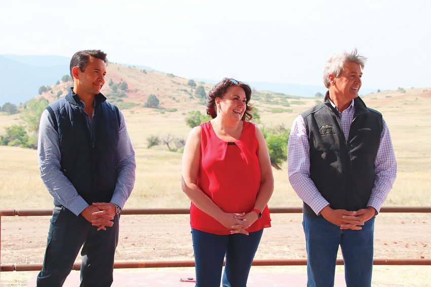 Commissioners Roger Partridge, Abe Laydon and Lora Thomas stand in the gazebo in Sandstone Ranch Sept. 18.