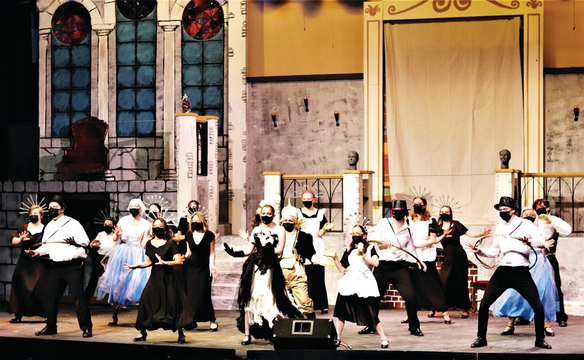 Cast members from Golden High School's production of Beauty and the Beast perform the famous "Be Our Guest" number.