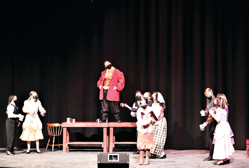 Gaston dances in Golden High School's "Beauty and the Beast."