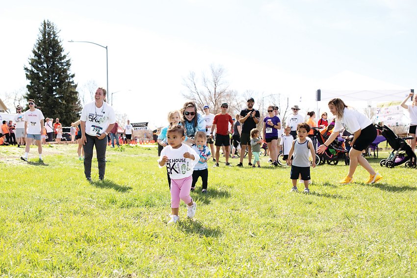Children participate in relay games at Hope House’s 5k and Fun Run.