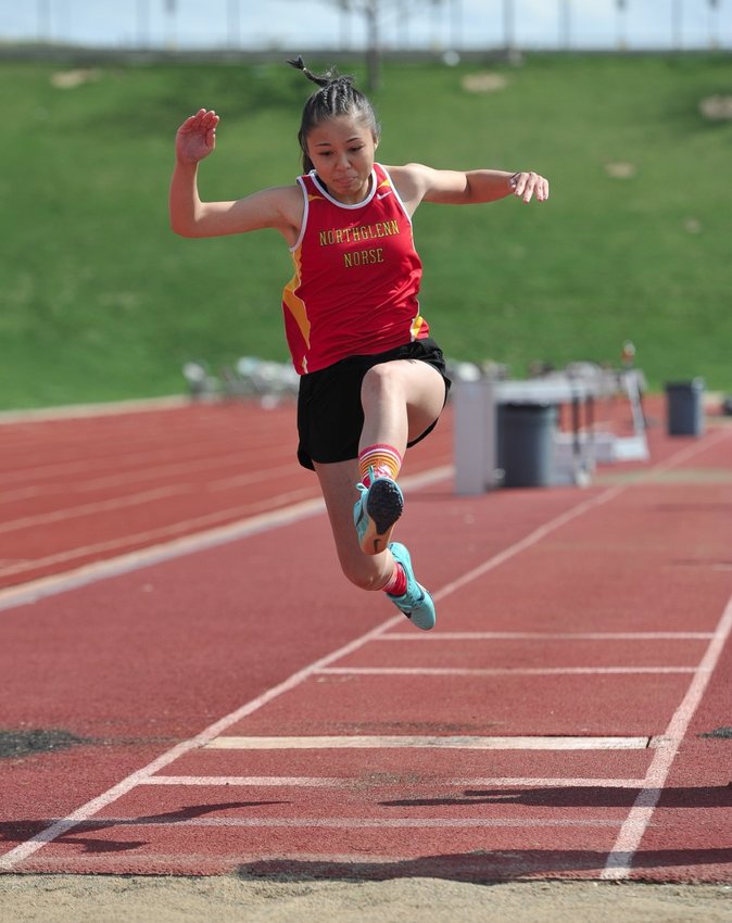 Northglenn sophomore Kiann Usada makes a broad-jump attempt, during the May 5 Horizon Rust-Buster track and field meet, at District 12 North Stadium in Westminster. This was the first track and field meet in nearly two years for many of these Adams 12 Five Star athletes.