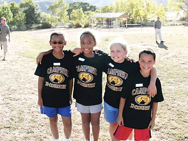 Campbell Elementary School Running Club. From left, Arianna Hakim, Delaney Holland, Alyssa Smith, Justin Andrade.