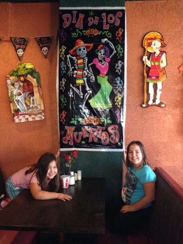 An old photo of my nieces while we were out celebrating Día de los Muertos, probably about 10 years ago — Cassie, left, is now 16 and Morgan, right, is now 20.