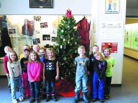 Students at Cresson Elementary School in Cripple Creek celebrated the Christmas season by making tree ornaments from clay. The tree was auctioned at the Aspen Mine Center Dec. 14 and the proceeds donated to the Cripple Creek Care Center.