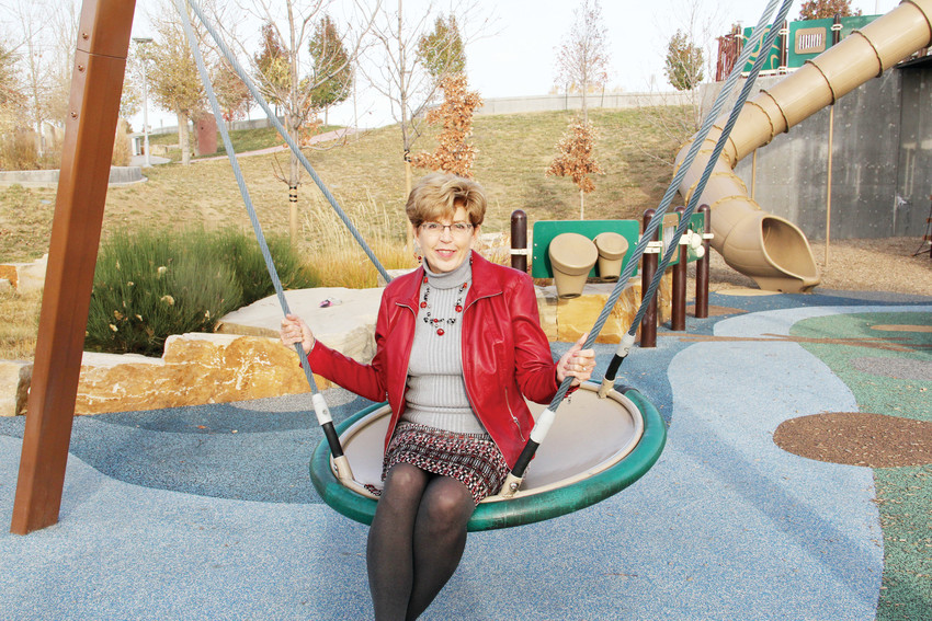 Mayor Cathy Noon sits on a swing at Centennial Center Park Oct. 31. The park, which sits just behind Civic Center, opened in 2012 during Noon’s tenure.