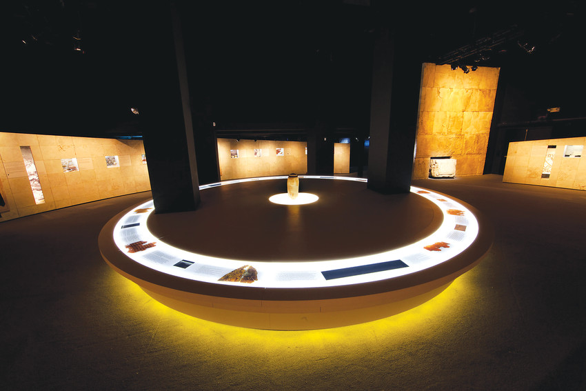 Specially-designed display cases protect the ancient examples of the Dead Sea Scrolls in an exhibit at the Denver Museum of Nature and Science.