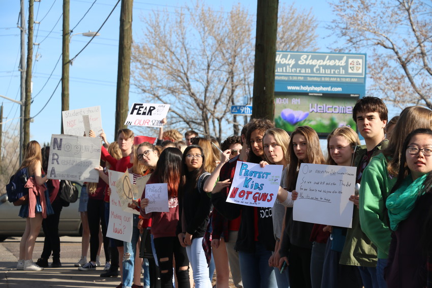 Several hundred Lakewood High School students walked out of school in solidarity with students all over the nation, who are marking one month since the massacre in Parkland, Florida. 
Students lined up for more than a block along Kipling Street to hold signs urging action on gun violence in the country.