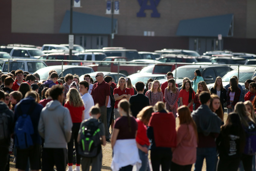 Student and teachers at Arvada West High School stood in silence on the athletic field of their school for 17 minutes to remember the students who died in Florida last month.