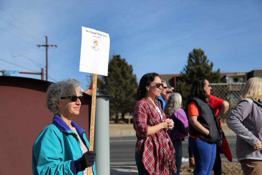 Amanda Trosten-Bloom stood in support of students at Arvada West High School March 14. “My hope is that kids doing this across the country will get the attention of the lawmakers,” she said.”