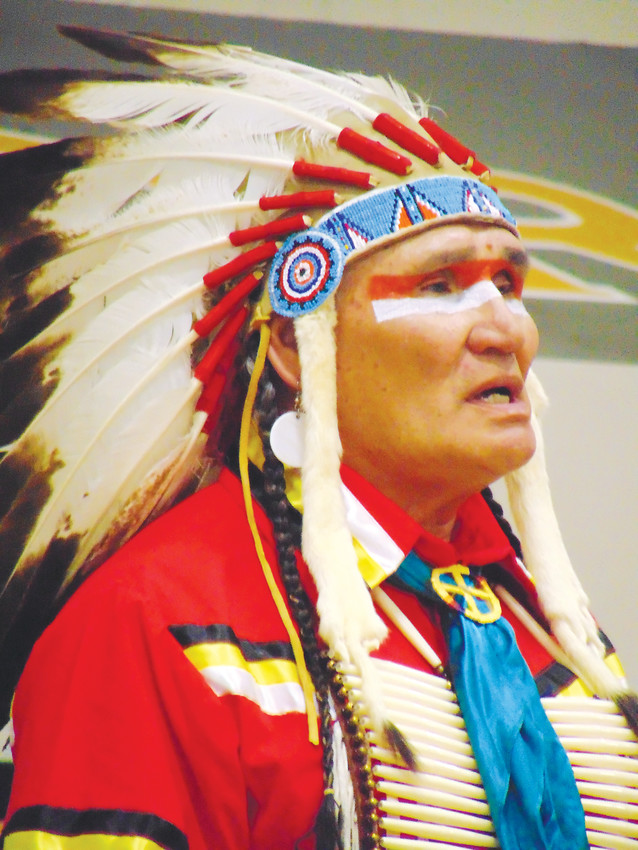 Arapaho tribal elder Darrell Lone Bear oversaw the ceremonial dancing at Arapahoe High School, which he said was to convey the warrior spirit.